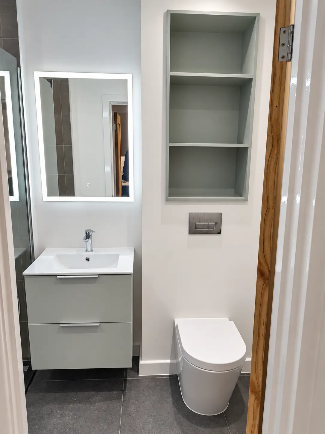 Completed compact bathroom vanity and storage
